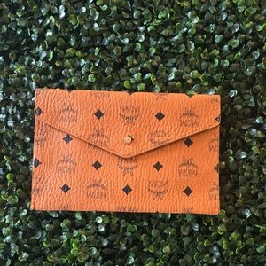 MCM Vibrant Orange Monogram Envelope Clutch